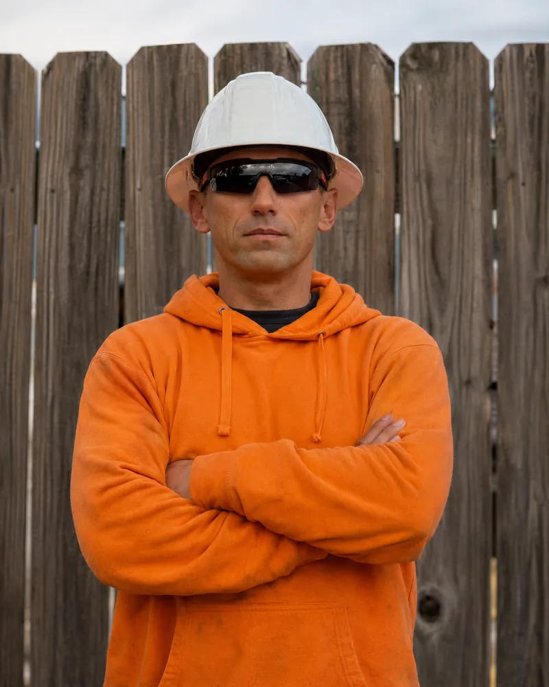 Dominika Tsybina's dad, a telecommunications professional in a hard hat