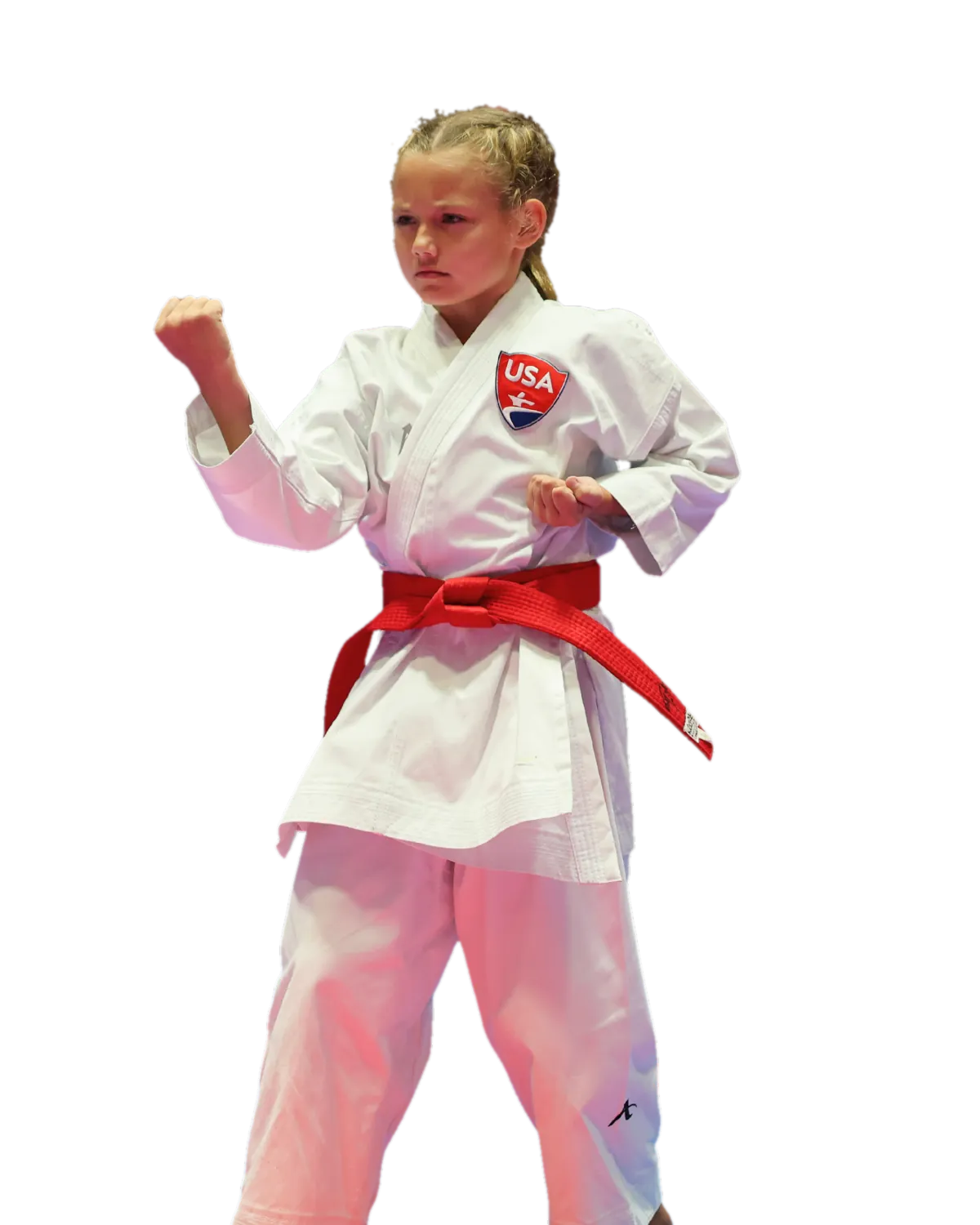 Karate athlete Dominika Tsybina standing in a fighting stance in her gi